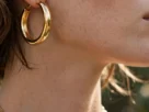 Gold jewelry styling with hoops and chains